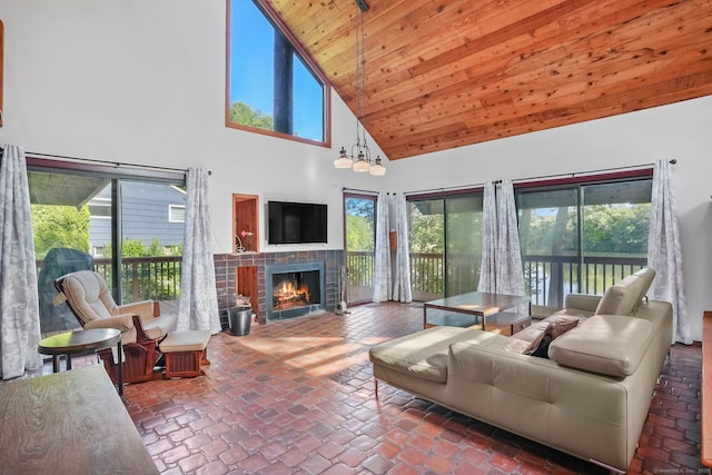 12 Sage Rd, Danbury, CT 06810 - living area with a fireplace, high vaulted ceiling, wooden ceiling, and healthy amount of natural light