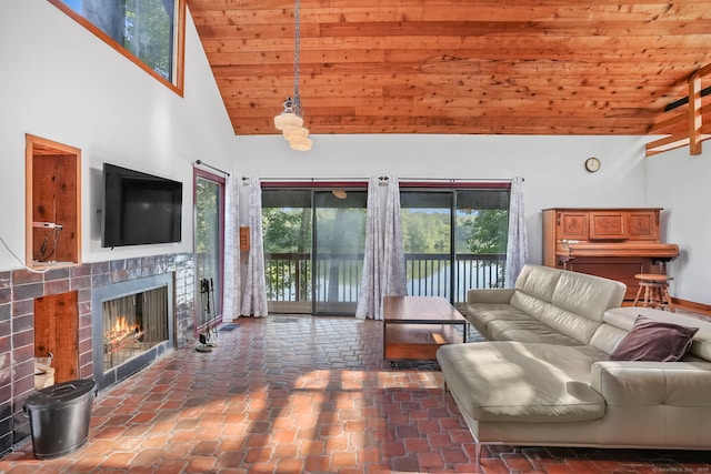 12 Sage Rd, Danbury, CT 06810 - living area featuring wooden ceiling, high vaulted ceiling, and a warm lit fireplace