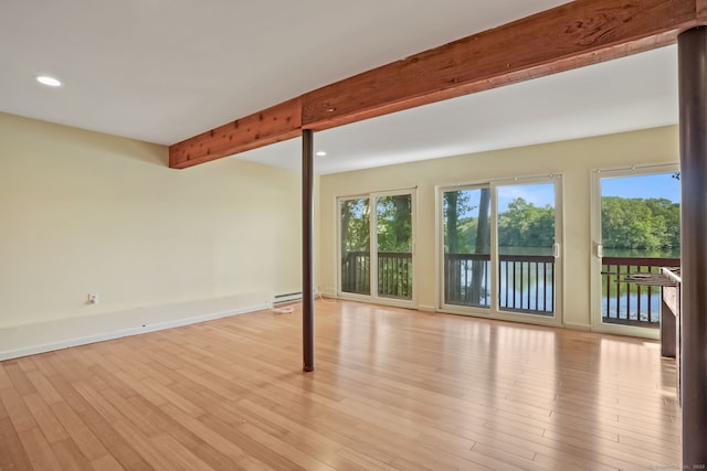 12 Sage Rd, Danbury, CT 06810 - unfurnished living room with beam ceiling, plenty of natural light, recessed lighting, and light wood-style floors