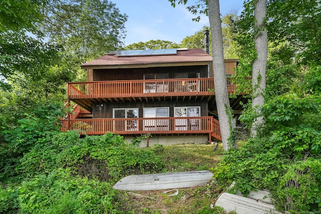 12 Sage Rd, Danbury, CT 06810 - rear view of house featuring a deck and solar panels