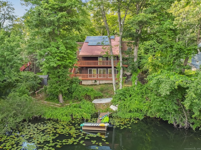 12 Sage Rd, Danbury, CT 06810 - back of property with solar panels and a water view