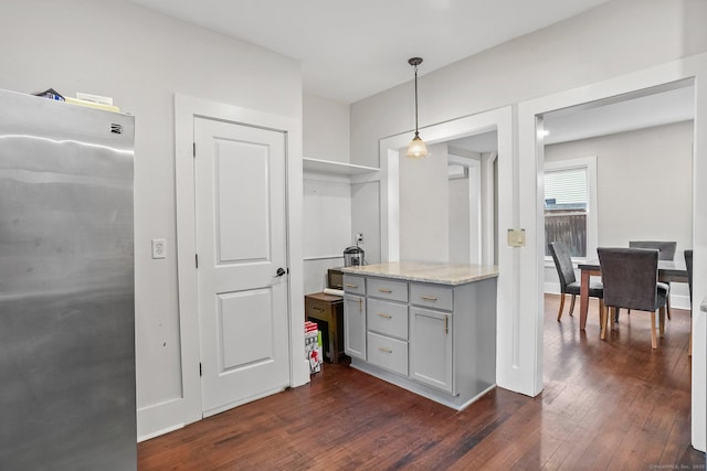 79 W Wooster St, Danbury, CT 06810 - kitchen with freestanding refrigerator, dark wood finished floors, gray cabinets, and decorative light fixtures