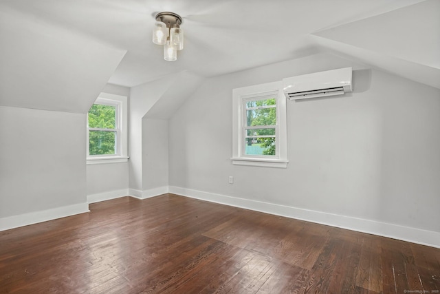 79 W Wooster St, Danbury, CT 06810 - bonus room with an AC wall unit, lofted ceiling, plenty of natural light, and wood-type flooring