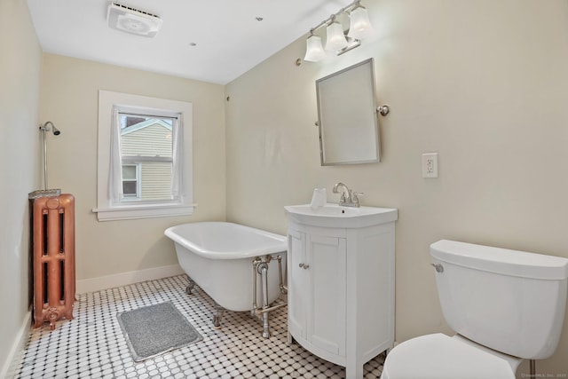 79 W Wooster St, Danbury, CT 06810 - full bath with radiator heating unit, vanity, and a soaking tub