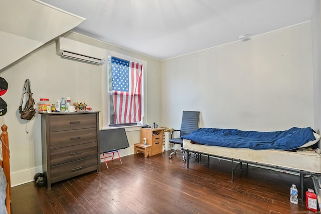79 W Wooster St, Danbury, CT 06810 - bedroom with an AC wall unit and dark wood-style flooring