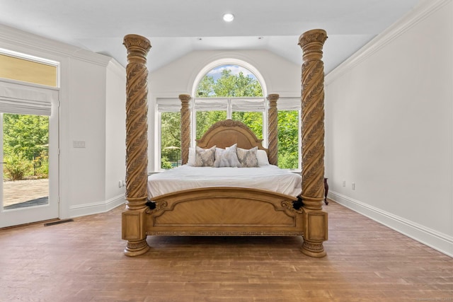 274 Sharon Tpke, Goshen, CT 06756 - bedroom featuring access to exterior, vaulted ceiling, and wood finished floors