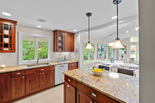 28 Codfish Ln, Weston, CT 06883 - kitchen with stainless steel dishwasher, decorative light fixtures, glass insert cabinets, light stone countertops, and light tile patterned floors