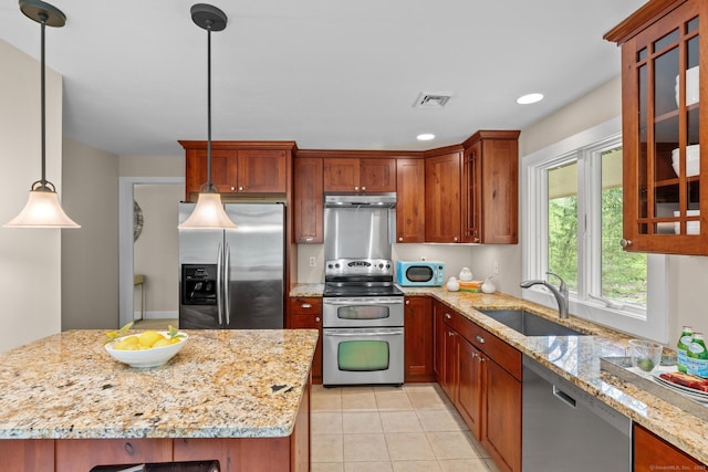 28 Codfish Ln, Weston, CT 06883 - kitchen featuring appliances with stainless steel finishes, under cabinet range hood, light stone countertops, glass insert cabinets, and recessed lighting