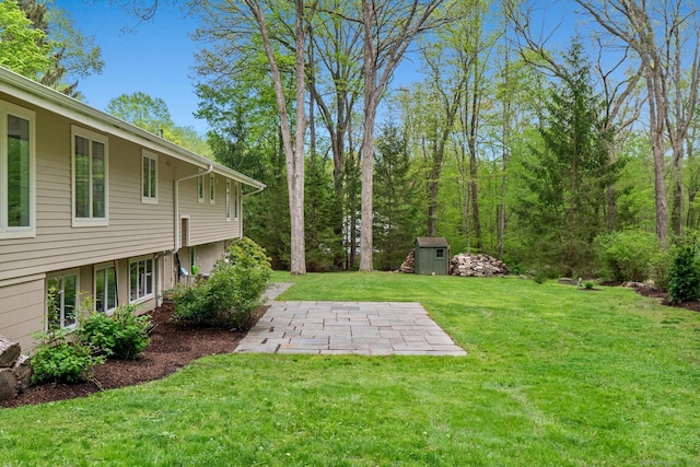 28 Codfish Ln, Weston, CT 06883 - view of green lawn featuring a patio and a shed