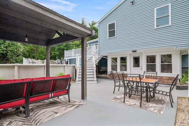 845 Five Mile River Rd, Putnam, CT 06260 - view of patio with stairs, an outdoor living space, and outdoor dining area
