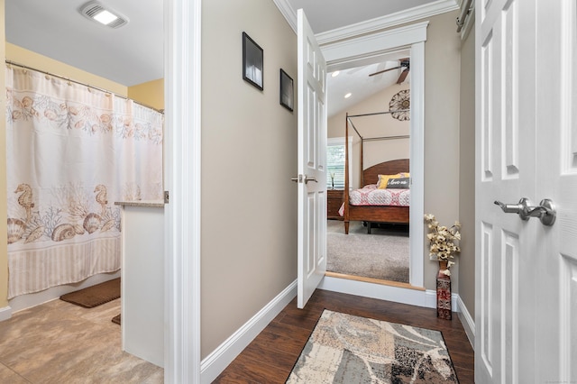 845 Five Mile River Rd, Putnam, CT 06260 - hallway featuring wood finished floors, ornamental molding, and lofted ceiling