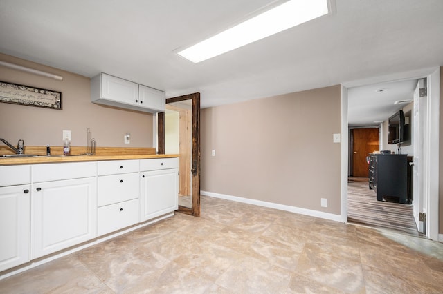 845 Five Mile River Rd, Putnam, CT 06260 - kitchen featuring white cabinetry and light countertops