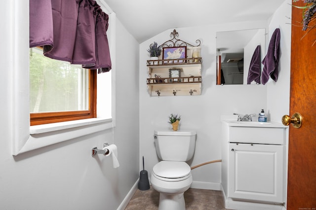 845 Five Mile River Rd, Putnam, CT 06260 - half bathroom featuring vanity, vaulted ceiling, and tile patterned floors