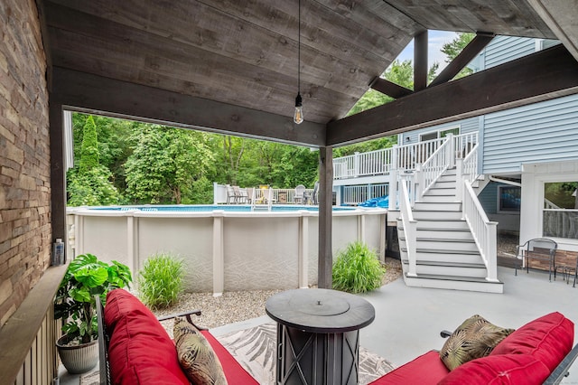 845 Five Mile River Rd, Putnam, CT 06260 - view of patio with stairs, an outdoor living space, an outdoor pool, and a wooden deck