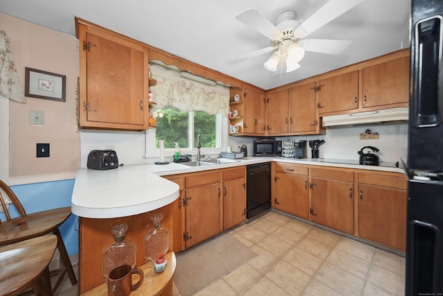 97 Edgewood Ave, Thomaston, CT 06787 - kitchen featuring under cabinet range hood, black appliances, light countertops, ceiling fan, and brown cabinets