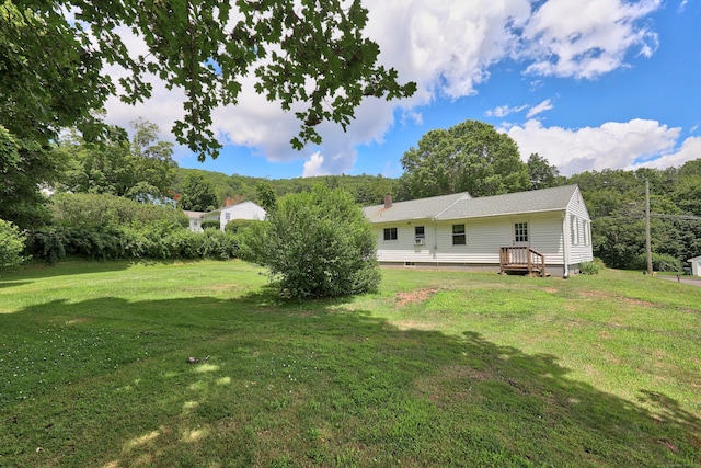 97 Edgewood Ave, Thomaston, CT 06787 - view of green lawn featuring a deck