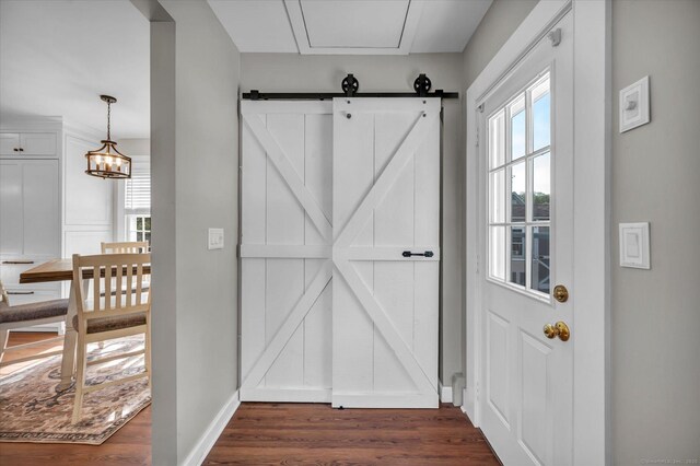 122 Nooks Hill Rd, Cromwell, CT 06416 - doorway featuring dark wood-style flooring and a barn door