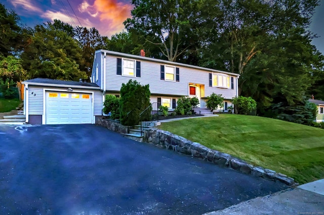 43 Berner Ter, Milford, CT 06460 - bi-level home with a garage, a front lawn, and driveway