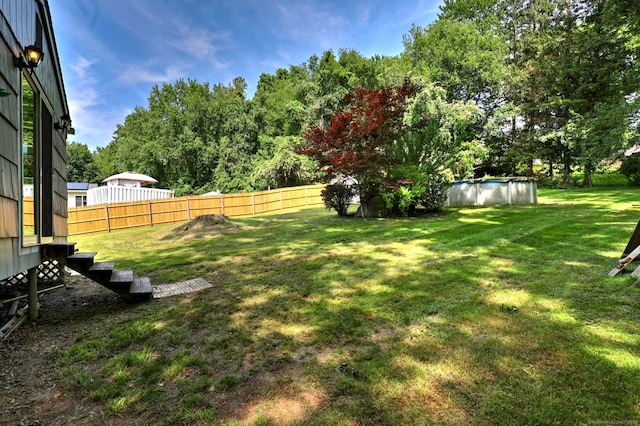 43 Berner Ter, Milford, CT 06460 - view of yard with an outdoor pool and view of scattered trees