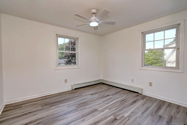 43 Berner Ter, Milford, CT 06460 - spare room featuring light wood-style floors, a baseboard heating unit, and a ceiling fan