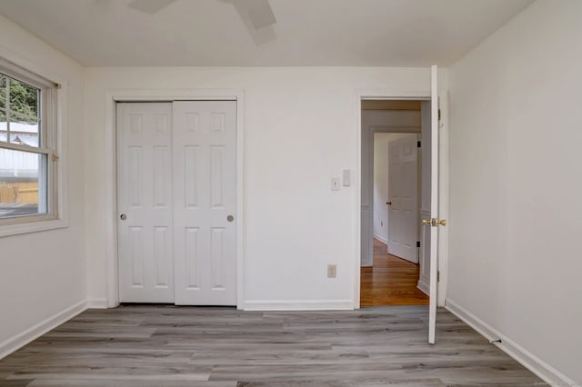 43 Berner Ter, Milford, CT 06460 - unfurnished bedroom featuring light wood-style floors and a closet