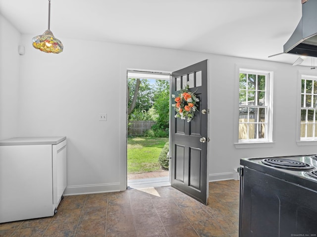 161 White St, Stratford, CT 06615 - entryway featuring baseboards and dark stone finish flooring