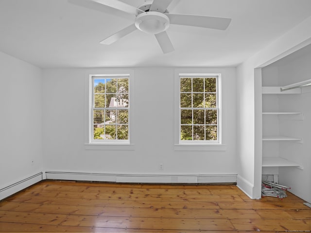161 White St, Stratford, CT 06615 - spare room with ceiling fan, baseboard heating, and wood-type flooring