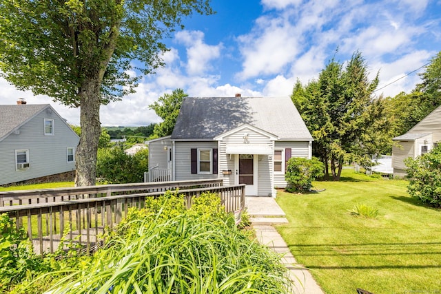 15 Boardman St, Bristol, CT 06010 - bungalow with a front lawn and roof with shingles