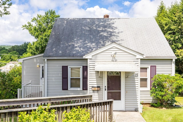 15 Boardman St, Bristol, CT 06010 - cape cod house with a shingled roof and a chimney