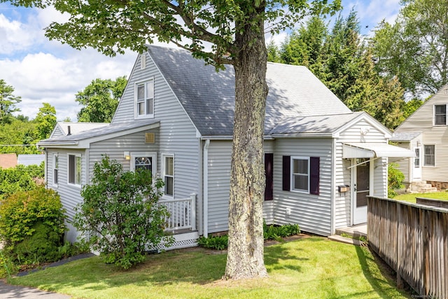 15 Boardman St, Bristol, CT 06010 - view of front of property featuring a front lawn and roof with shingles