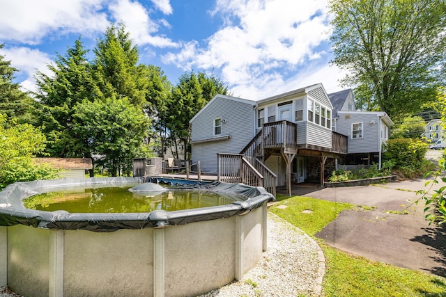 15 Boardman St, Bristol, CT 06010 - rear view of property with stairway and a deck