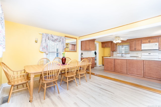 15 Boardman St, Bristol, CT 06010 - dining room with light wood finished floors and ceiling fan