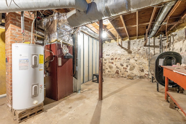 15 Boardman St, Bristol, CT 06010 - unfinished basement with electric water heater and heating fuel