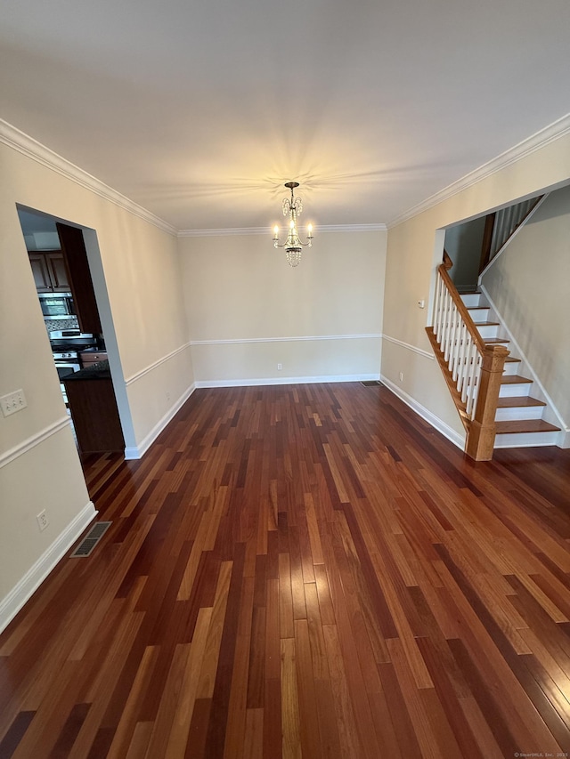1 Sampson Ter Unit 801, Danbury, CT 06810 - unfurnished room featuring dark wood finished floors, stairs, a chandelier, and ornamental molding