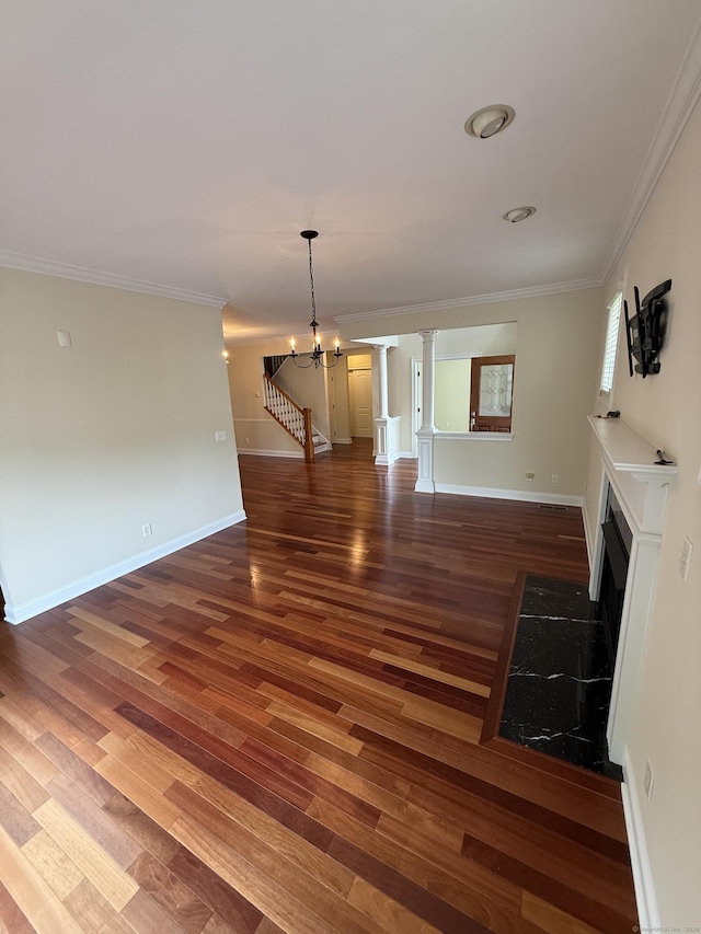1 Sampson Ter Unit 801, Danbury, CT 06810 - unfurnished living room with wood finished floors, a chandelier, ornamental molding, stairs, and a fireplace