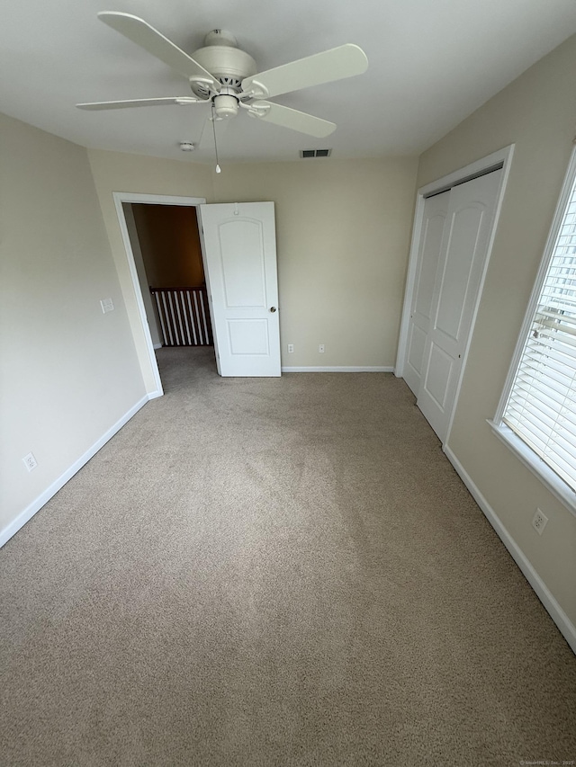 1 Sampson Ter Unit 801, Danbury, CT 06810 - unfurnished bedroom featuring carpet flooring, a closet, and a ceiling fan