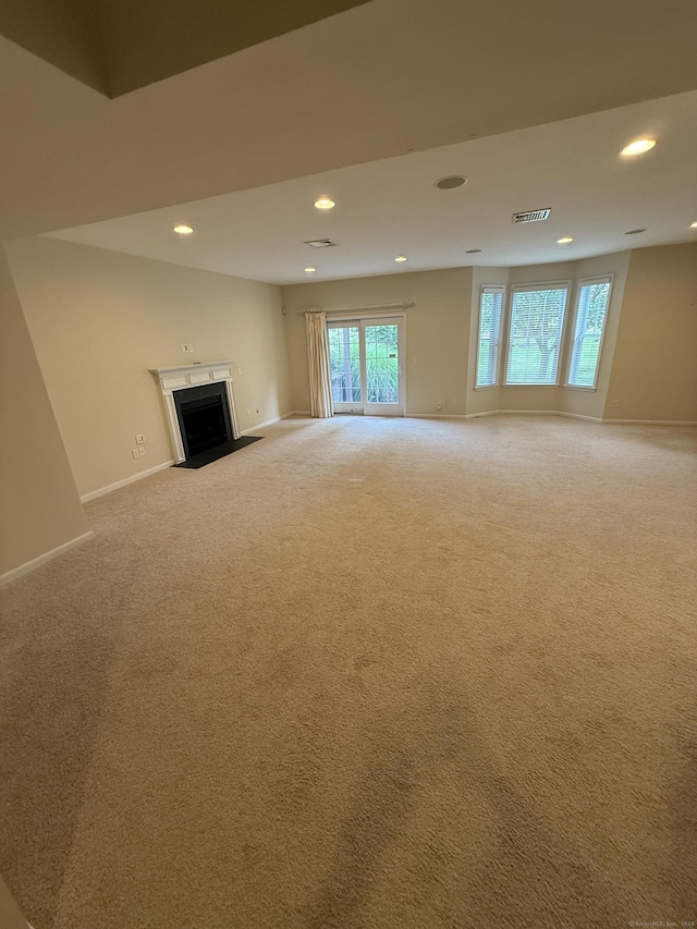 1 Sampson Ter Unit 801, Danbury, CT 06810 - unfurnished living room with recessed lighting, carpet floors, and a fireplace with flush hearth