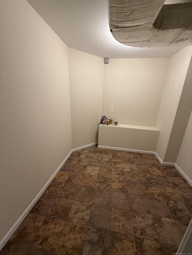 1 Sampson Ter Unit 801, Danbury, CT 06810 - unfurnished room with stone finish flooring and baseboards