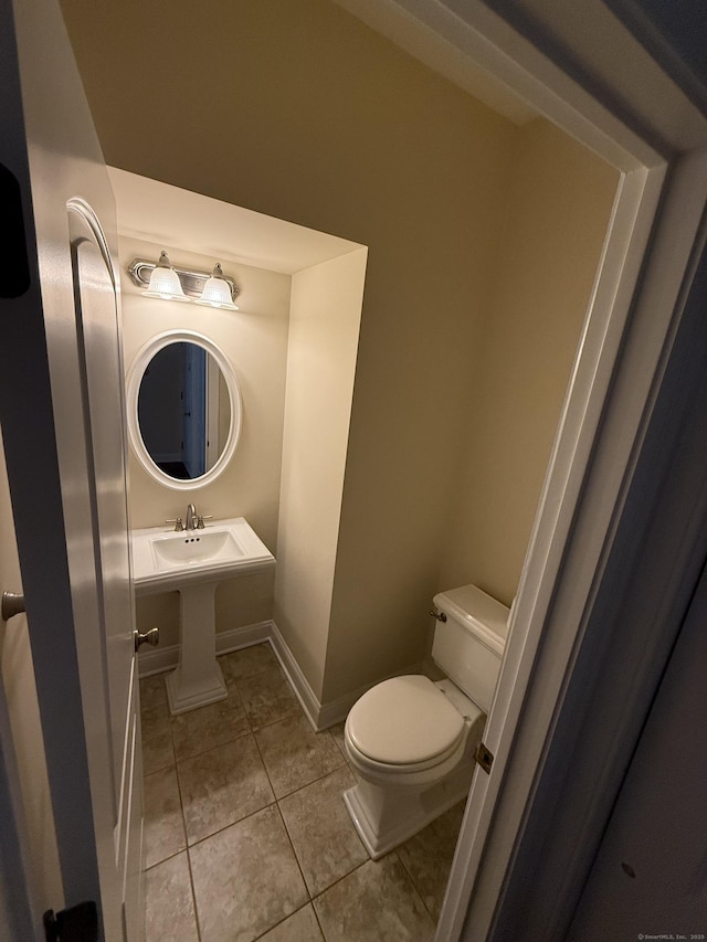 1 Sampson Ter Unit 801, Danbury, CT 06810 - half bathroom featuring toilet and tile patterned floors