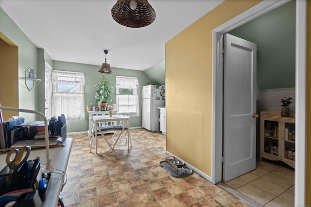 103 Eaton St, Bridgeport, CT 06604 - dining space featuring light stone finish floors and lofted ceiling