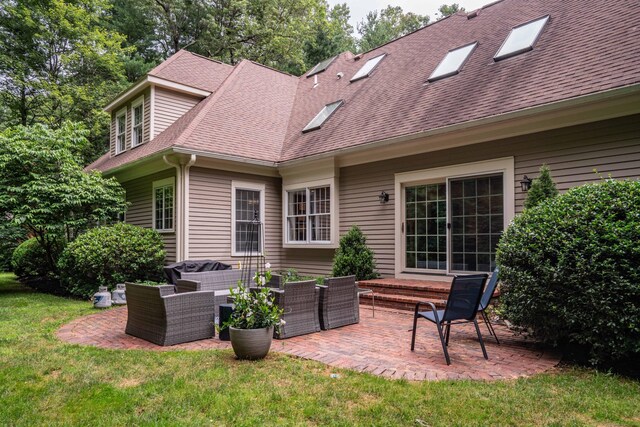 6 Salisbury Way, Farmington, CT 06032 - back of property featuring a patio area, an outdoor living space, roof with shingles, and a lawn