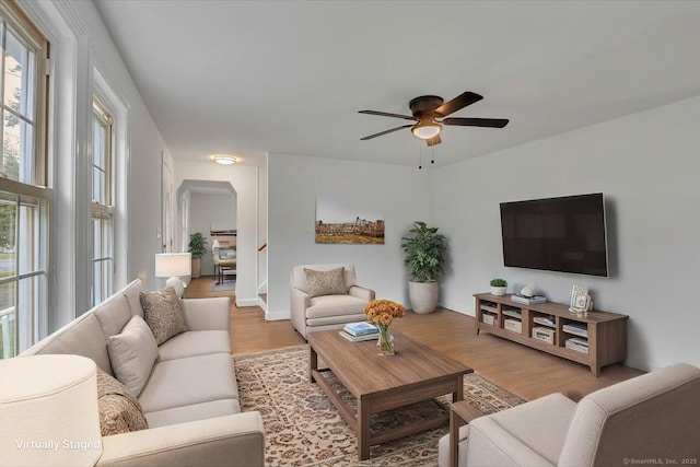 270 Hills St, East Hartford, CT 06118 - living area with a ceiling fan and light wood-style flooring