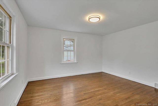 270 Hills St, East Hartford, CT 06118 - spare room featuring wood finished floors