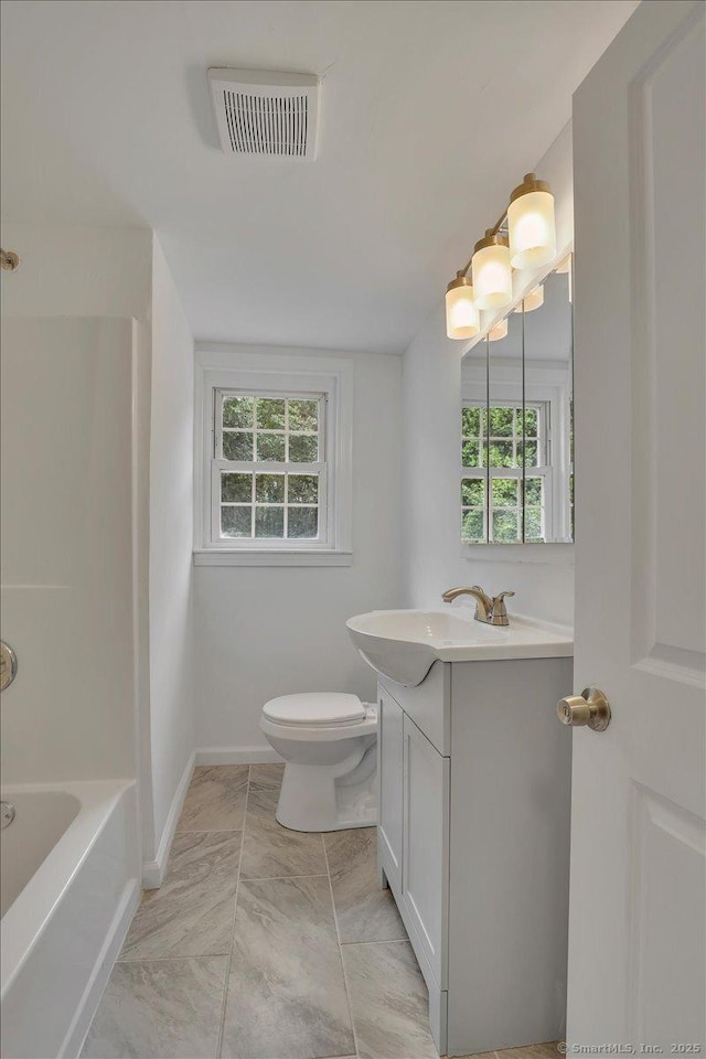 270 Hills St, East Hartford, CT 06118 - full bathroom featuring vanity, healthy amount of natural light, and tub / shower combination