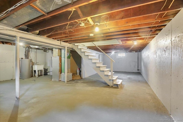 270 Hills St, East Hartford, CT 06118 - basement featuring water heater, stairway, and heating unit