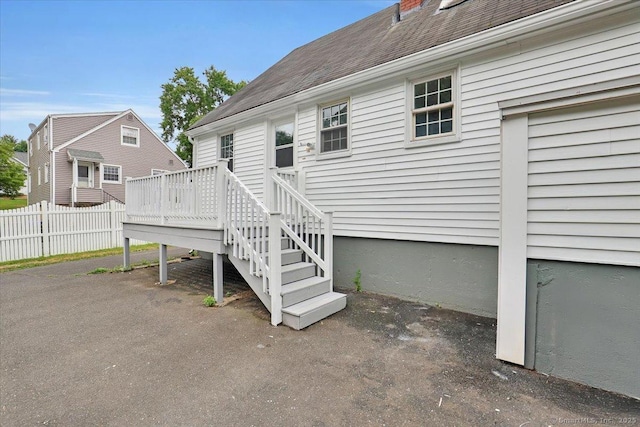 270 Hills St, East Hartford, CT 06118 - rear view of property with a wooden deck and roof with shingles