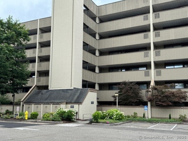 85 Viscount Dr Unit A34, Milford, CT 06460 - view of apartment building / complex with uncovered parking
