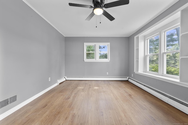 17 Norwood Rd, New Haven, CT 06513 - unfurnished room featuring healthy amount of natural light, wood finished floors, crown molding, a baseboard radiator, and a ceiling fan