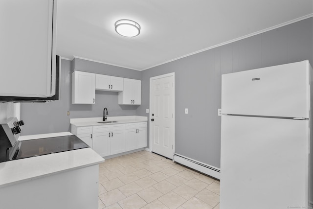 17 Norwood Rd, New Haven, CT 06513 - kitchen with freestanding refrigerator, a baseboard heating unit, electric range oven, white cabinets, and crown molding