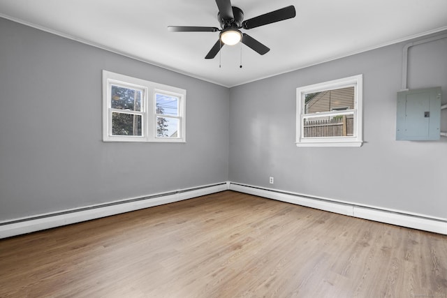 17 Norwood Rd, New Haven, CT 06513 - spare room with electric panel, wood finished floors, baseboard heating, ornamental molding, and ceiling fan